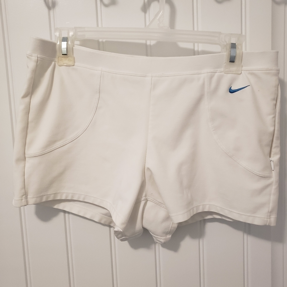 Nike White Athletic Shorts with Blue Swoosh